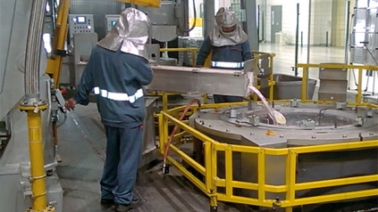 men at work in aluminium melting / pouring  department